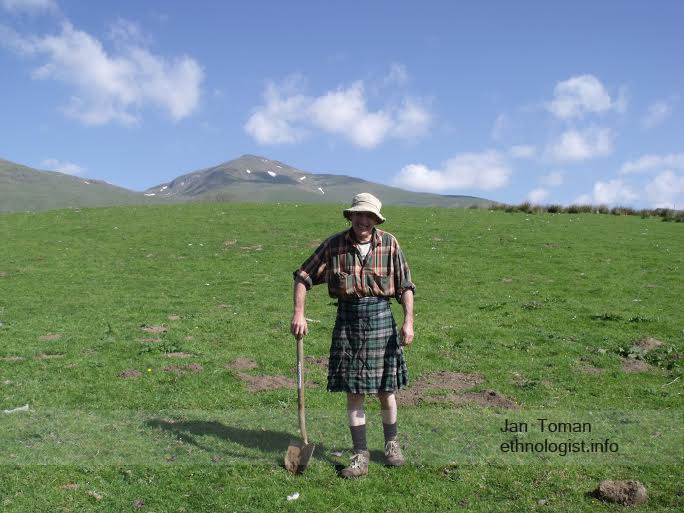The farmer from Tombreck farm. Behind farmer is mountain of Ben Lawers. Photo: Jan Toman